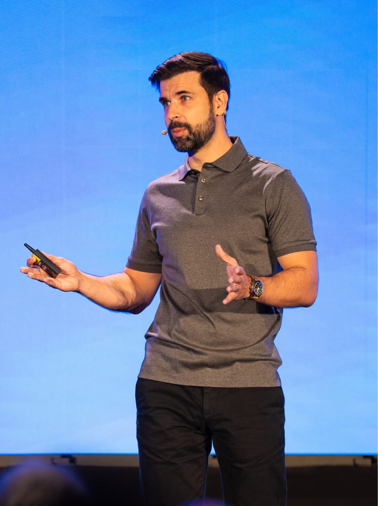 Tim Soulo speaking on stage