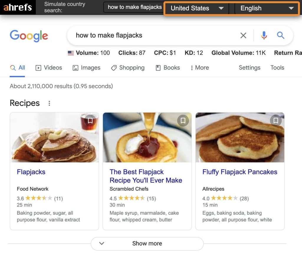 "Ahrefs SEO ツールバーで米国検索をシミュレートした際に表示される、英国検索とは大きく異なる構成の Google 検索結果ページ
"

