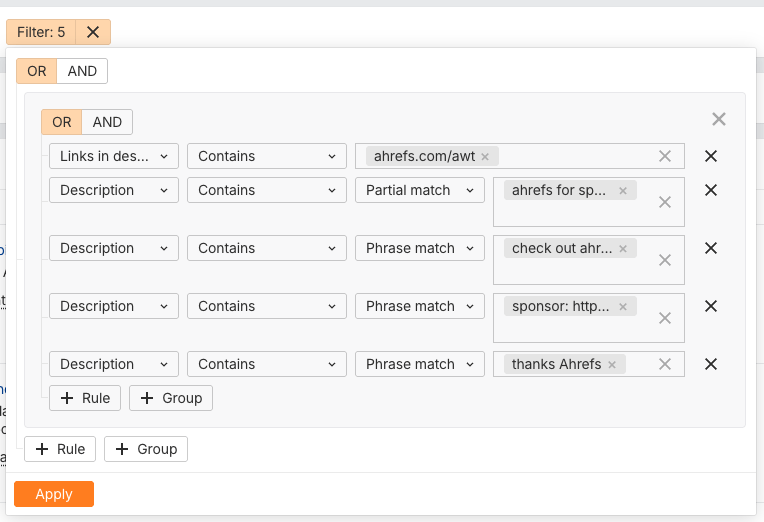 Ahrefs ブランドレーダーの YouTube フィルター画面。説明欄内のパートナー関連フレーズ（「ahrefs.com/awt」「ahrefs for sp…」「check out ahr…」「sponsor: http…」「thanks Ahrefs」）を検索する、5 つのネストされた条件でスポンサーコンテンツを検出している。