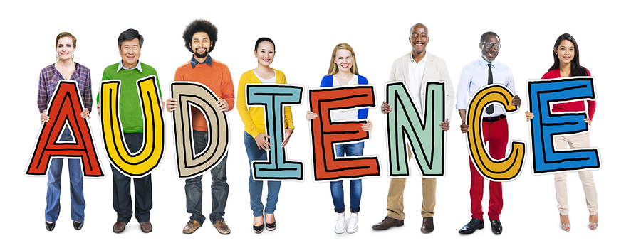 Group of People Standing Holding Audience Letter