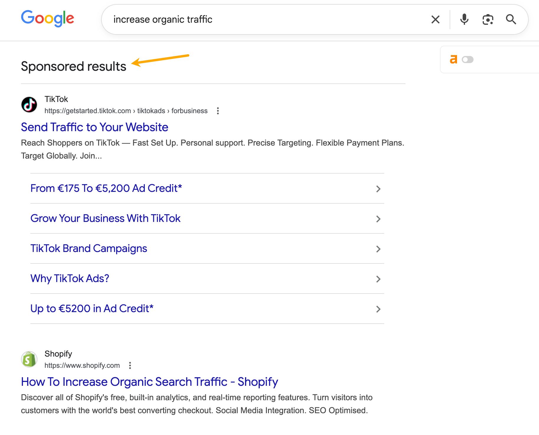 Google search results for "increase organic traffic," showing sponsored TikTok and Shopify ads. An arrow highlights "Sponsored results."