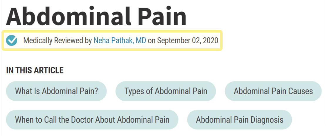 Trecho de artigo sobre dor abdominal;  o texto mostra que o artigo foi revisado por um médico