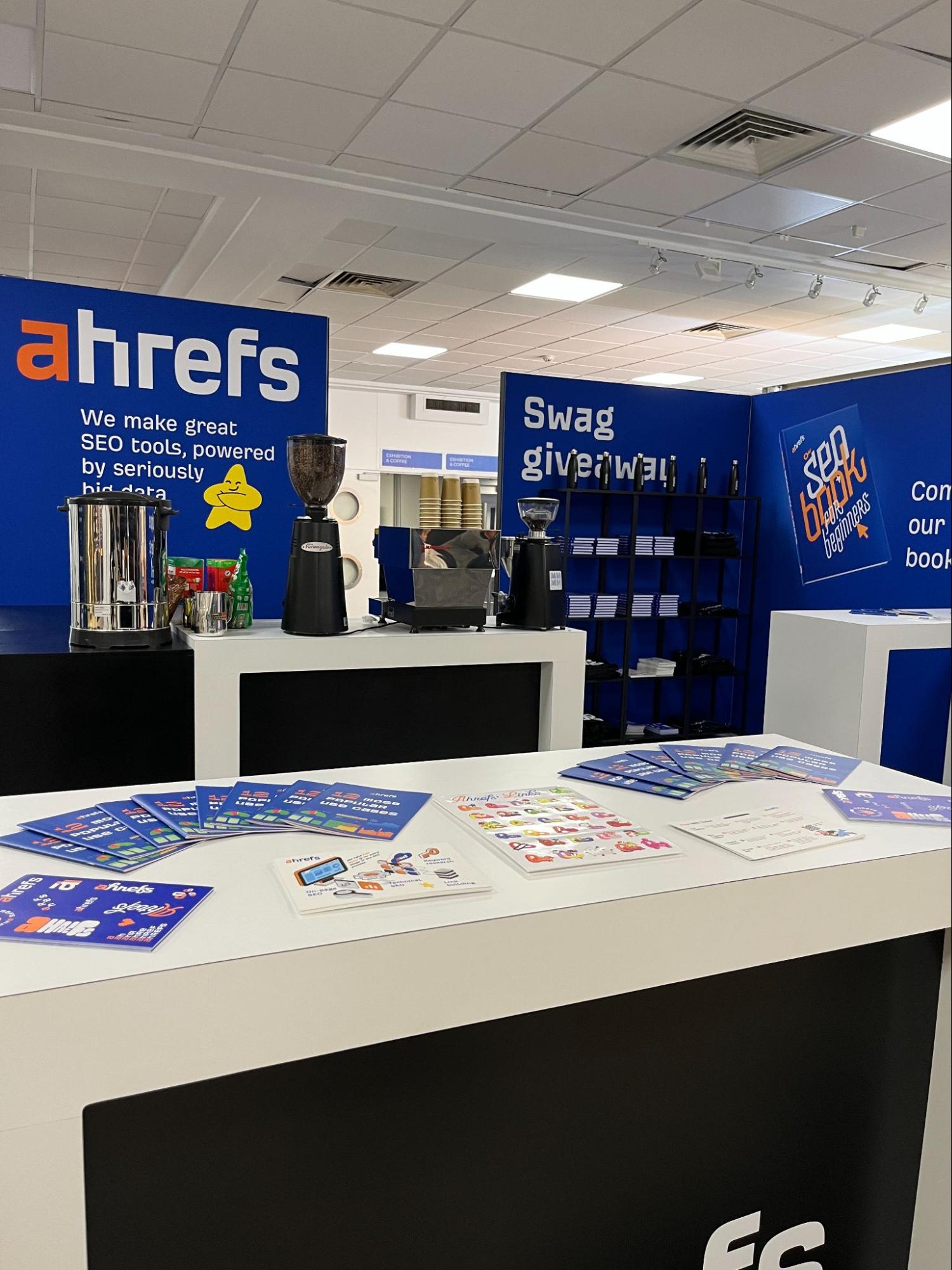 Ahrefs' fully stocked exhibitor stand 

