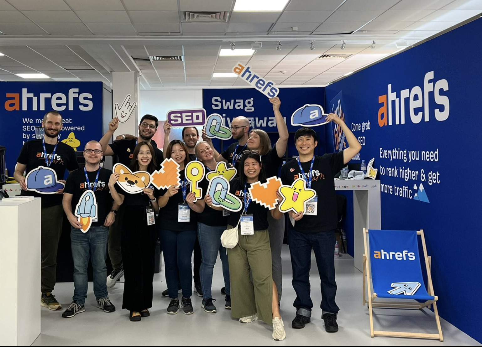 Ahrefs team posing for a picture
