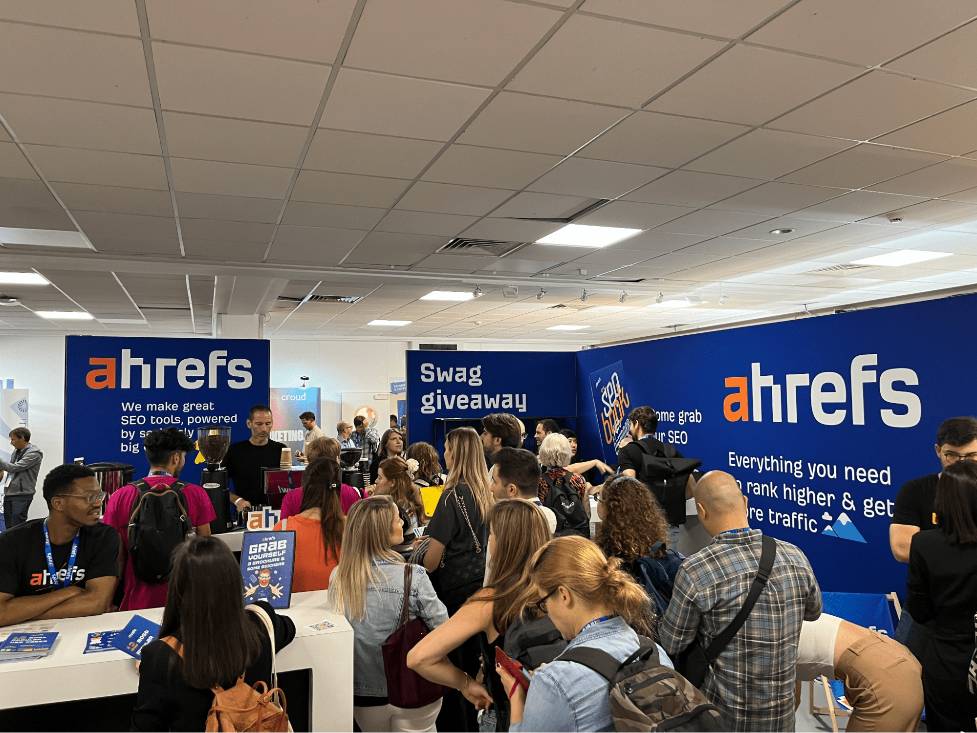 Busy crowds at Ahrefs' exhibitor stand
