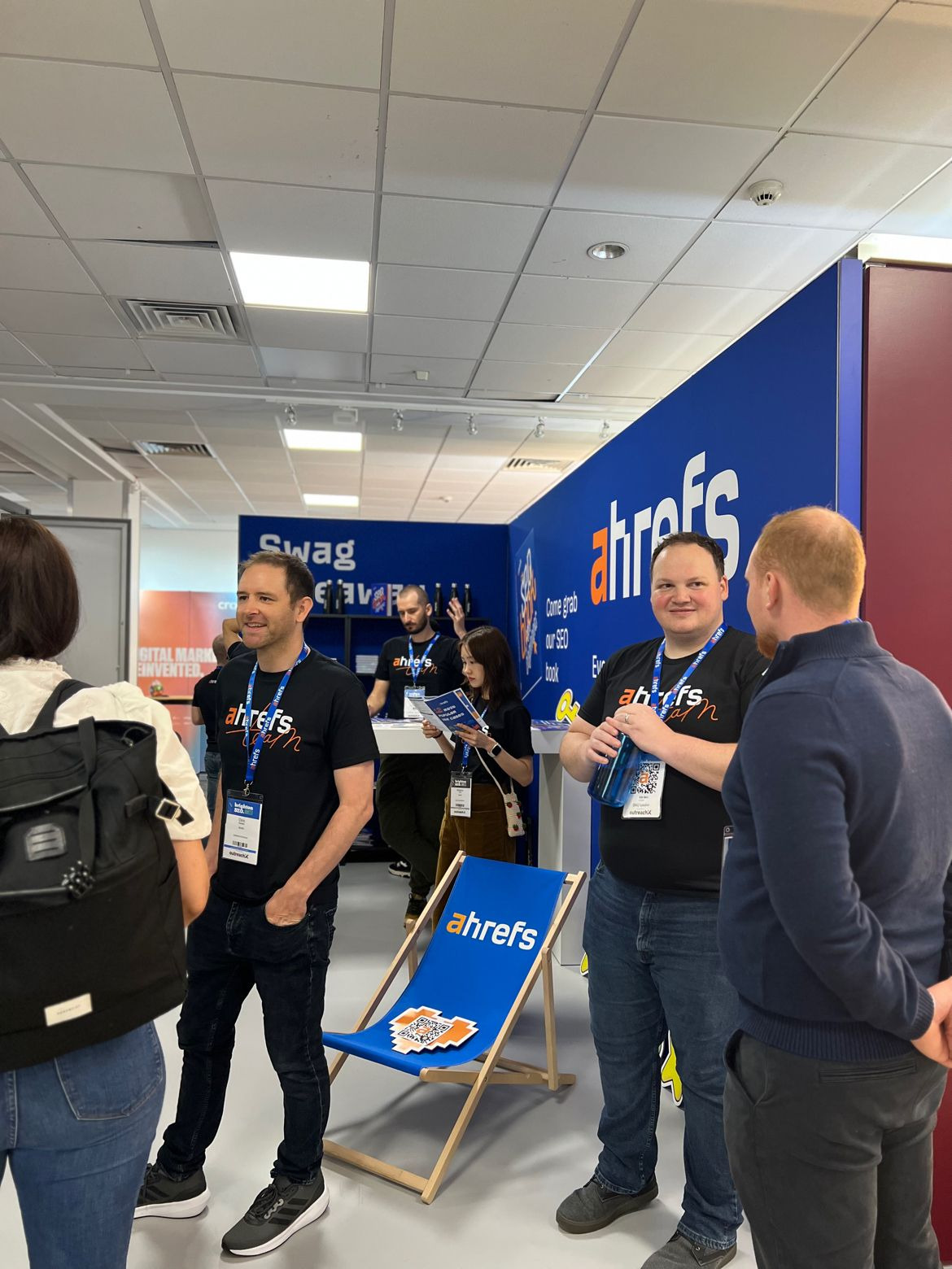 Patrick Stox and Chris Haines talking to customers about Ahrefs
