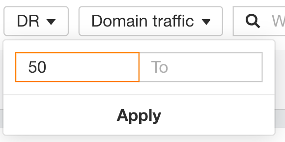 Applying the Domain Rating filter to a minimum of 50 in Ahrefs' Competitive Analysis report.