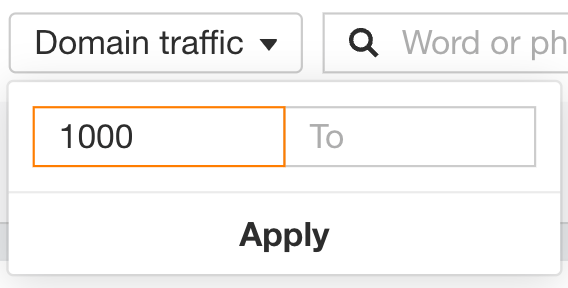 Applying the Domain Traffic filter to a minimum of 1000 in Ahrefs' Competitive Analysis report.