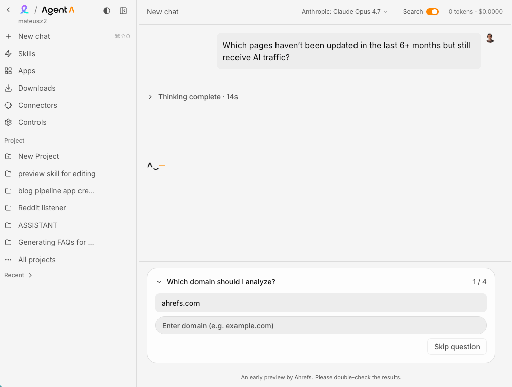 A screenshot of Ahrefs' "Agent A" AI assistant interface. A user has entered the prompt: "Which pages haven’t been updated in the last 6+ months but still receive AI traffic?" and the agent is processing the request for the domain ahrefs.com.