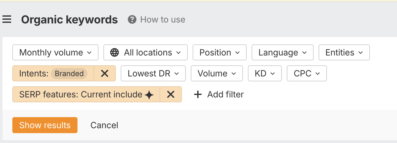 Ahrefs Site Explorer Organic keywords filters with Branded intent and a SERP features filter selected.